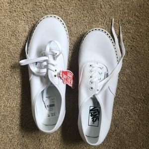 brand new white vans with black checkered edges